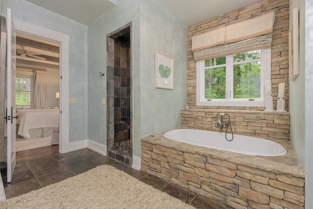 bathroom with separate shower and tub