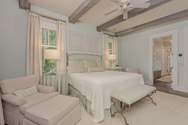 bedroom featuring beamed ceiling, wood-type flooring, and ceiling fan