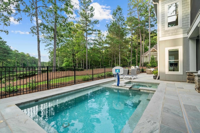 1101 Brookside, Greensboro, GA 30642 - view of pool featuring a pool with connected hot tub, fence, and a patio