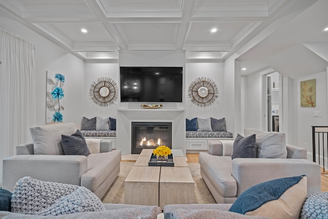 1101 Brookside, Greensboro, GA 30642 - living room featuring coffered ceiling, light wood finished floors, a glass covered fireplace, beamed ceiling, and recessed lighting