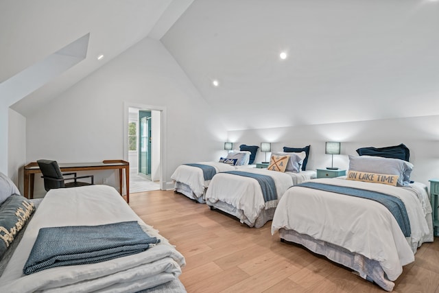 1101 Brookside, Greensboro, GA 30642 - bedroom with high vaulted ceiling and light wood finished floors