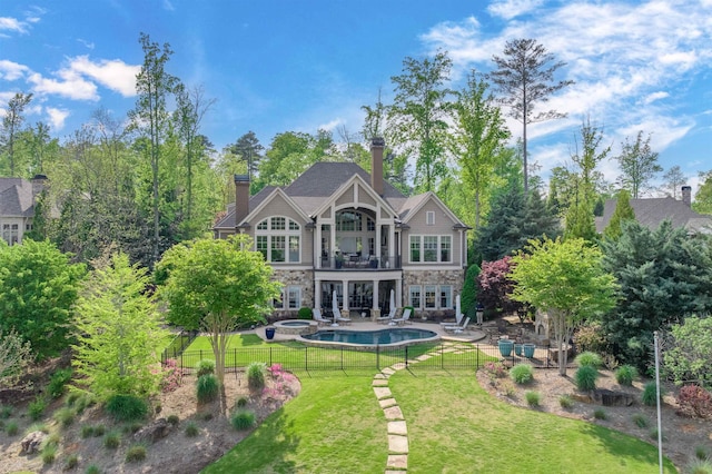 1071 Palmers Vw, Greensboro, GA 30642 - rear view of house with a patio area, a balcony, stone siding, a yard, and a fenced in pool