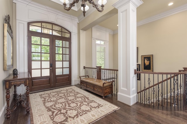 1071 Palmers Vw, Greensboro, GA 30642 - entryway featuring ornate columns, french doors, crown molding, hardwood / wood-style flooring, and a notable chandelier