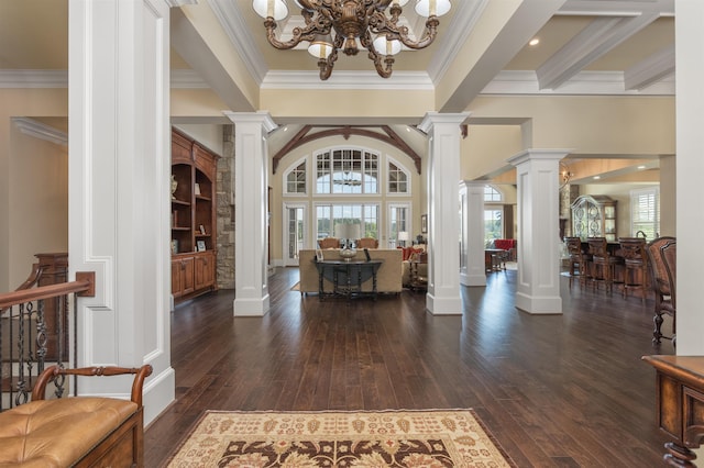 1071 Palmers Vw, Greensboro, GA 30642 - foyer entrance with decorative columns, dark wood finished floors, a notable chandelier, and crown molding