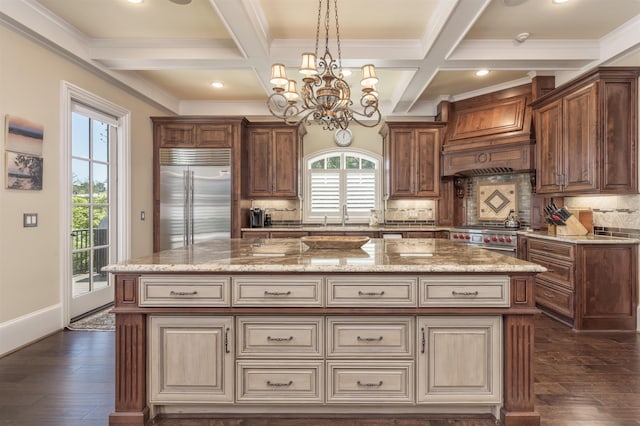 1071 Palmers Vw, Greensboro, GA 30642 - kitchen with a center island, high quality appliances, beamed ceiling, a notable chandelier, and dark wood-type flooring