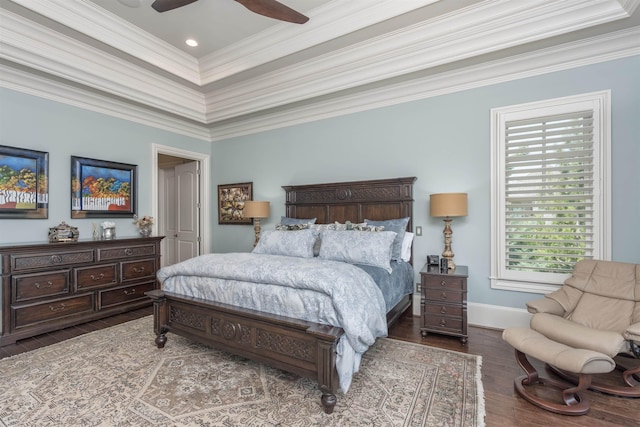 1071 Palmers Vw, Greensboro, GA 30642 - bedroom featuring a tray ceiling, baseboards, a ceiling fan, wood finished floors, and ornamental molding
