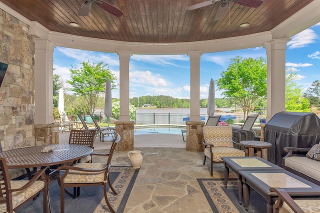 1071 Palmers Vw, Greensboro, GA 30642 - sunroom with wood ceiling, ornate columns, stone finish floor, and ornamental molding