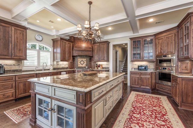 1071 Palmers Vw, Greensboro, GA 30642 - kitchen with double oven, tasteful backsplash, visible vents, and coffered ceiling