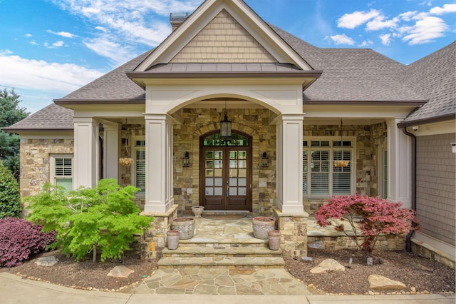 1071 Palmers Vw, Greensboro, GA 30642 - entrance to property with stone siding, covered porch, a shingled roof, and french doors