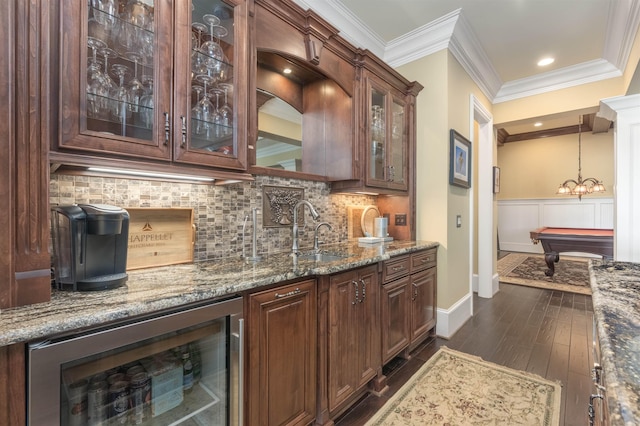 1071 Palmers Vw, Greensboro, GA 30642 - bar with a sink, beverage cooler, dark wood-type flooring, and ornamental molding