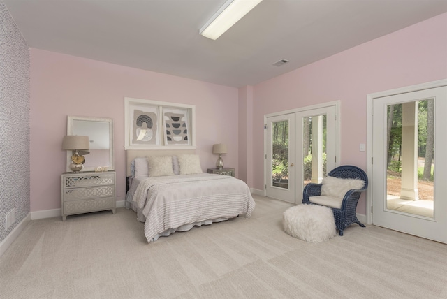 1040 Kimbrough Hill Ln, Greensboro, GA 30642 - bedroom featuring light carpet, multiple windows, and access to exterior