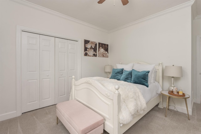 1040 Kimbrough Hill Ln, Greensboro, GA 30642 - bedroom featuring carpet floors, ornamental molding, a closet, and baseboards