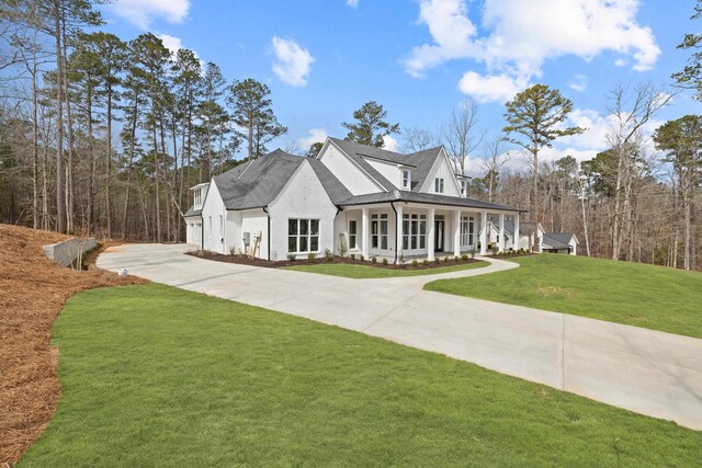 back of house with covered porch