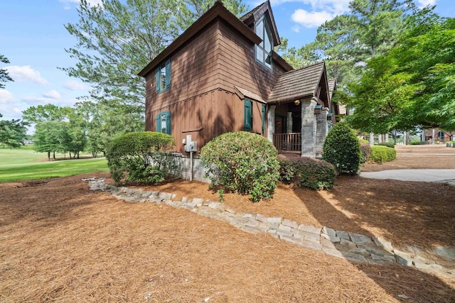 125 Secoffee Dr, Eatonton, GA 31024 - view of property exterior featuring stone siding