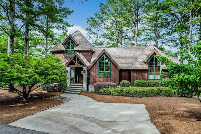 125 Secoffee Dr, Eatonton, GA 31024 - view of front facade featuring a chimney