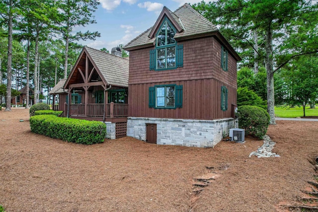 125 Secoffee Dr, Eatonton, GA 31024 - view of side of property with a chimney and cooling unit