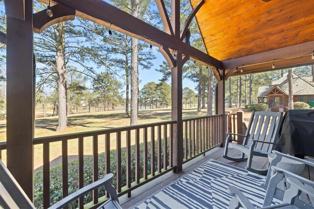 125 Secoffee Dr, Eatonton, GA 31024 - wooden terrace with a grill