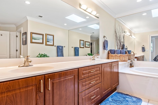 bathroom with ornamental molding, a bath, vanity, and a skylight