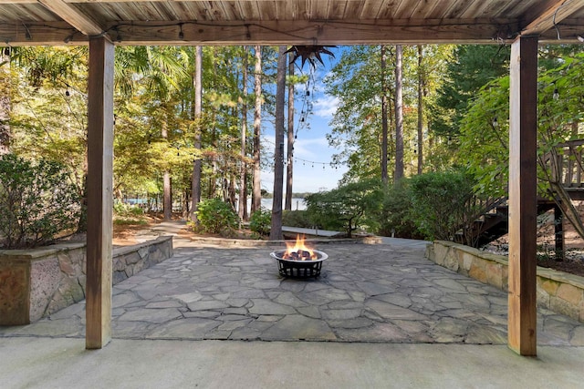 view of patio featuring an outdoor fire pit