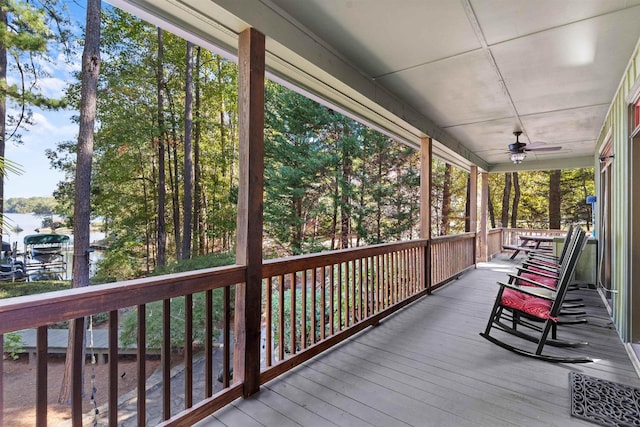 deck featuring ceiling fan and a porch