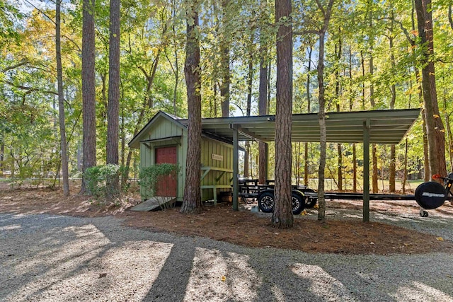 view of property's community featuring a storage shed