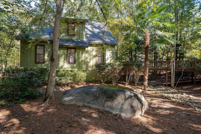 view of yard with a wooden deck