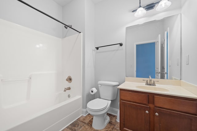 bathroom with vanity, shower / tub combination, toilet, and baseboards