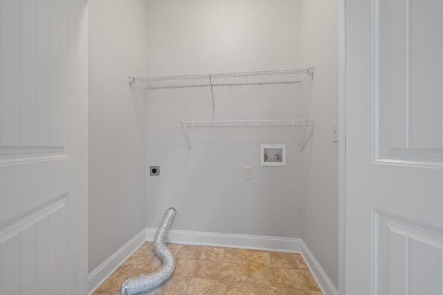 clothes washing area with hookup for a washing machine, baseboards, laundry area, and electric dryer hookup