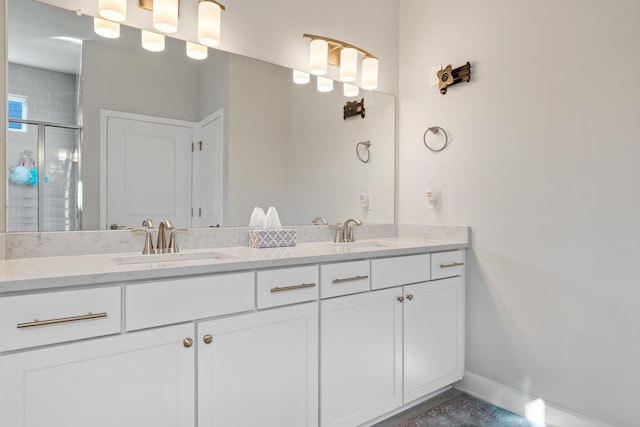 bathroom with vanity and walk in shower