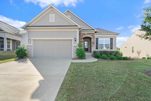 craftsman inspired home with a garage and a front yard