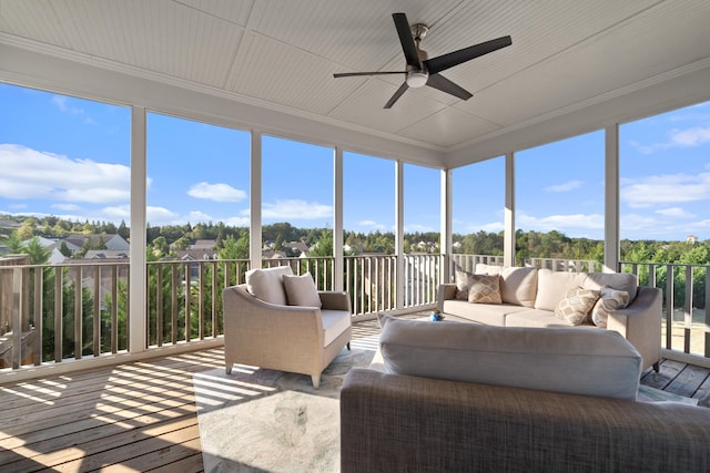 sunroom / solarium with ceiling fan