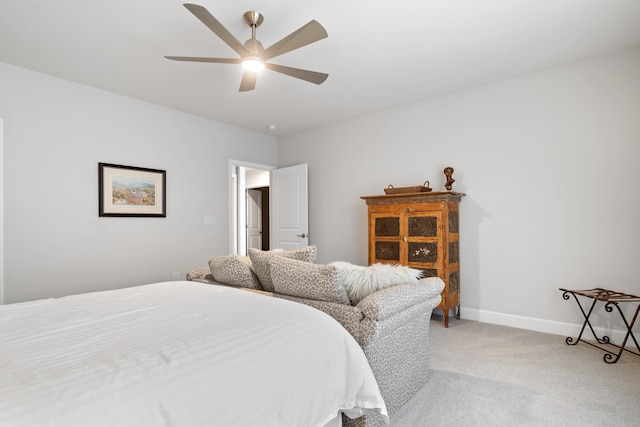 bedroom featuring ceiling fan and light colored carpet