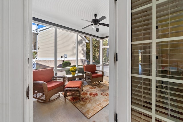 sunroom / solarium with ceiling fan