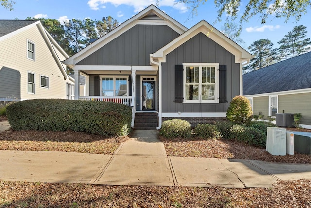 view of front of house featuring central AC and a porch