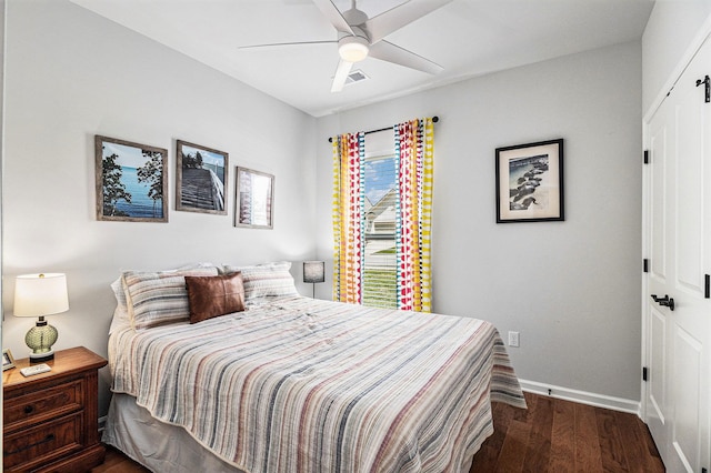 1000 Eight Knot Ct, Greensboro, GA 30642 - bedroom with wood finished floors, baseboards, a closet, and a ceiling fan