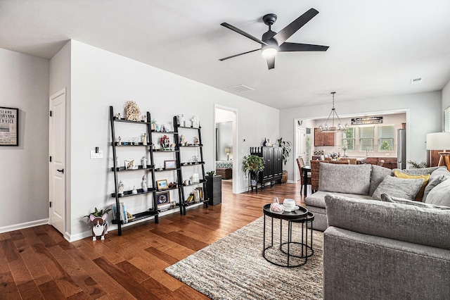 1000 Eight Knot Ct, Greensboro, GA 30642 - living area with a ceiling fan, wood finished floors, and baseboards