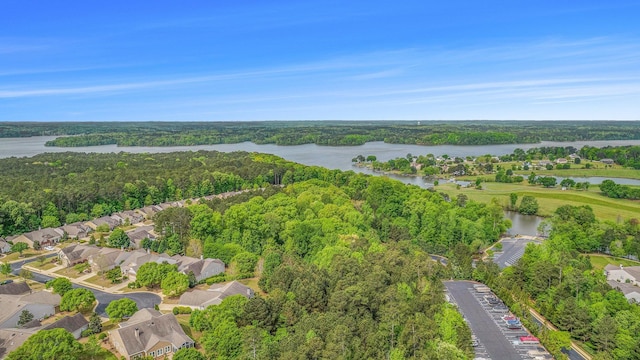 1000 Eight Knot Ct, Greensboro, GA 30642 - aerial view of property and surrounding area featuring a nearby body of water, a heavily wooded area, and nearby suburban area
