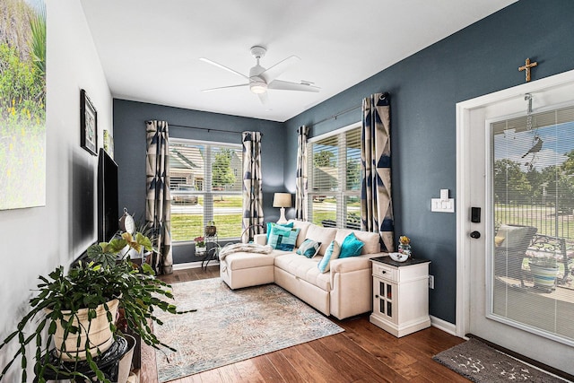 1000 Eight Knot Ct, Greensboro, GA 30642 - living room featuring a ceiling fan, dark wood-type flooring, and baseboards