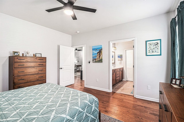 1000 Eight Knot Ct, Greensboro, GA 30642 - bedroom with dark wood-style floors, baseboards, ceiling fan, and ensuite bath