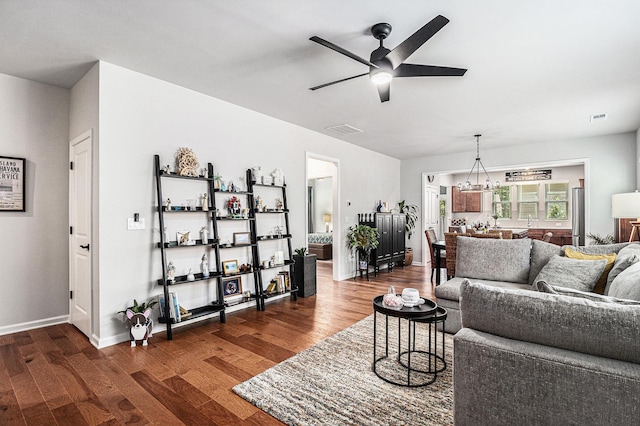 1000 Eight Knot Ct, Greensboro, GA 30642 - living area featuring ceiling fan, dark wood finished floors, and baseboards