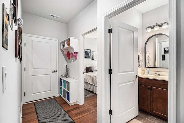 1000 Eight Knot Ct, Greensboro, GA 30642 - mudroom with dark wood-style floors and a sink