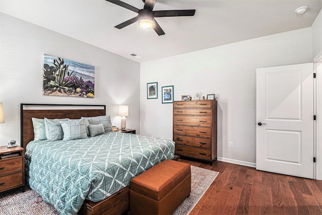 1000 Eight Knot Ct, Greensboro, GA 30642 - bedroom with dark wood-style flooring, ceiling fan, and baseboards