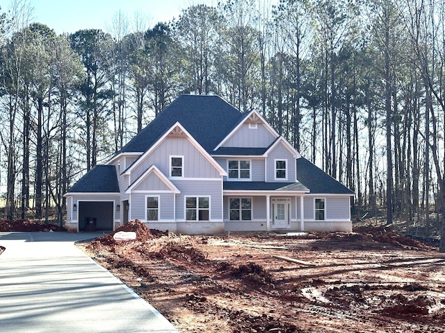 view of front of property with a garage