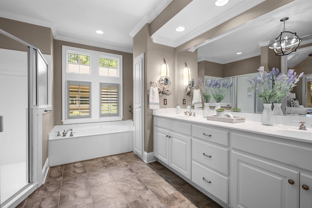 bathroom with vanity, ornamental molding, shower with separate bathtub, and an inviting chandelier