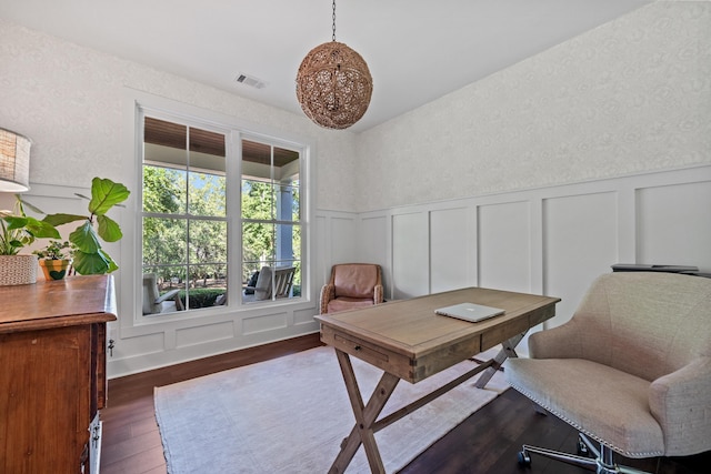 office space with dark wood-type flooring