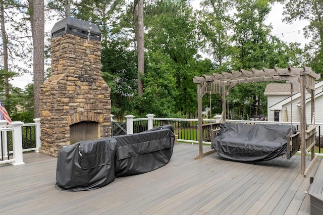 1811 Snug Harbor Dr, Greensboro, GA 30642 - deck featuring a pergola and an outdoor stone fireplace