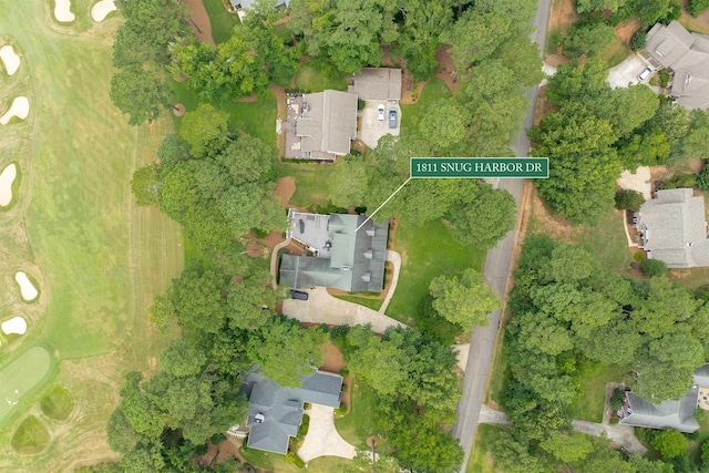 1811 Snug Harbor Dr, Greensboro, GA 30642 - aerial view of property and surrounding area with nearby suburban area and property parcel outlined