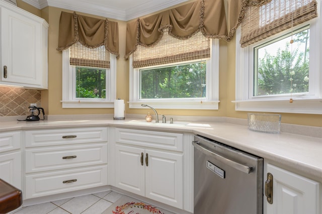 1811 Snug Harbor Dr, Greensboro, GA 30642 - kitchen featuring dishwasher, plenty of natural light, light tile patterned floors, and white cabinets
