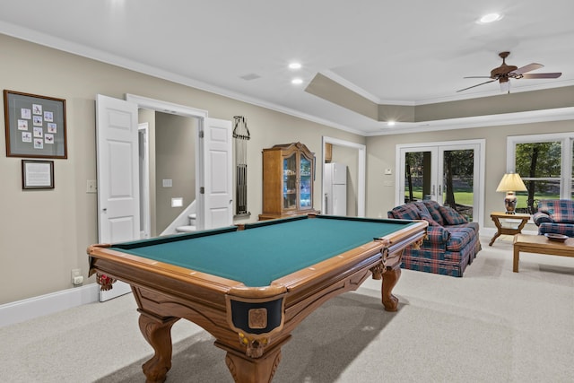 game room with crown molding, pool table, light carpet, a tray ceiling, and ceiling fan