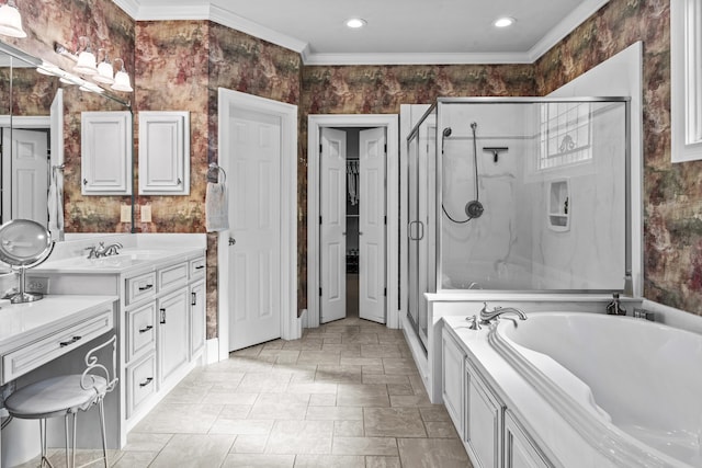 bathroom with ornamental molding, separate shower and tub, and vanity